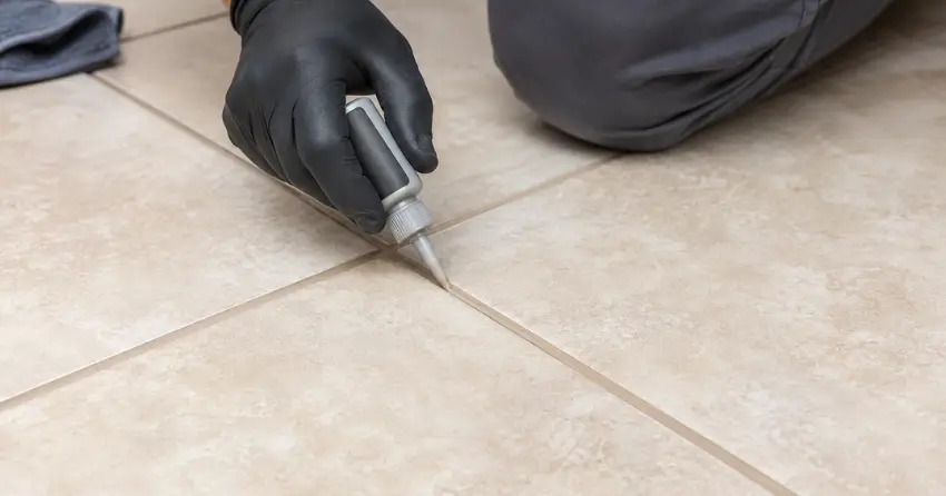 grout color sealing service being applied to floor tile in Edmonton